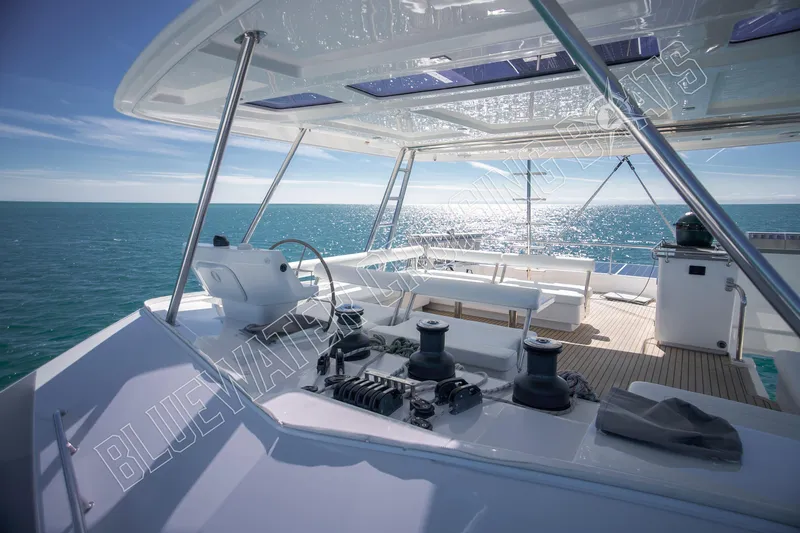 Sea Dog Yacht Photos Pics Luxurious 2020 Leopard 58 yacht deck with ocean view and modern amenities.