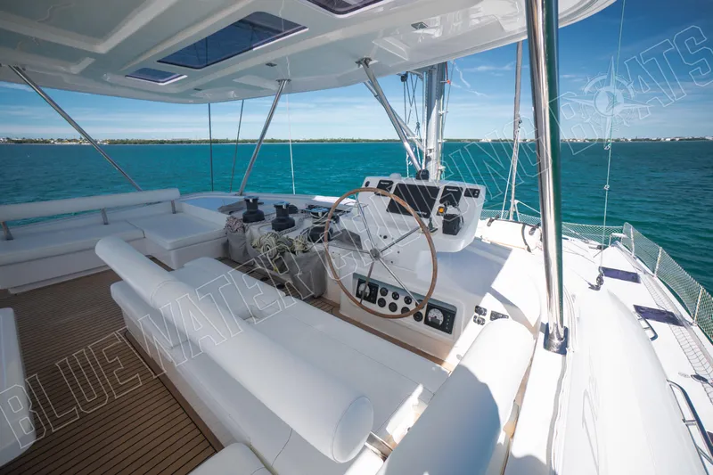 Sea Dog Yacht Photos Pics Luxurious 2020 Leopard 58 yacht helm with ocean view and sleek design.