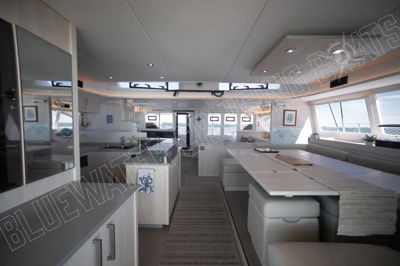 Sea Dog Yacht Photos Pics Luxurious interior of 2020 Leopard 58 yacht with modern design and spacious seating.