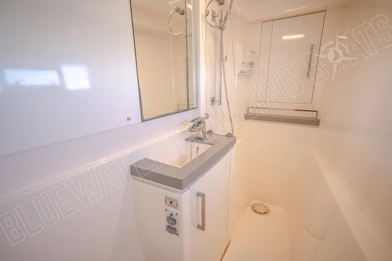 Sea Dog Yacht Photos Pics Modern bathroom in 2020 Leopard 58 yacht with sleek fixtures and ample storage.