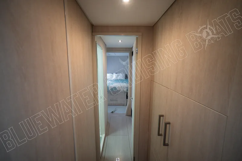 Sea Dog Yacht Photos Pics Hallway inside 2020 Leopard 58 yacht, leading to a bedroom.