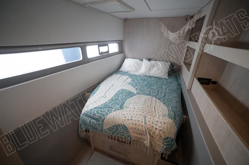 Sea Dog Yacht Photos Pics Cozy bedroom in 2020 Leopard 58 yacht with decorative bedding and natural light.
