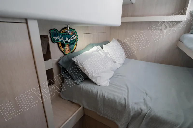 Sea Dog Yacht Photos Pics Cozy bedroom in 2020 Leopard 58 yacht with decorative wall art.