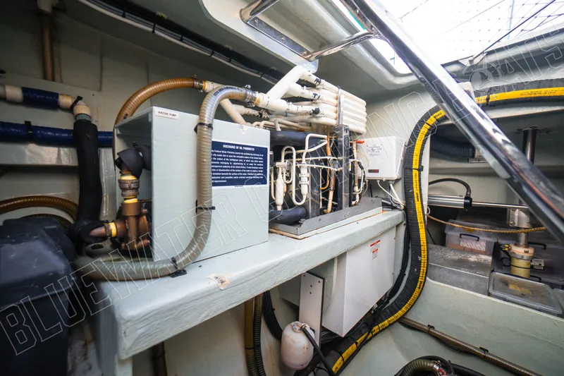 Sea Dog Yacht Photos Pics Engine room of 2020 Leopard 58 yacht with mechanical equipment and piping.