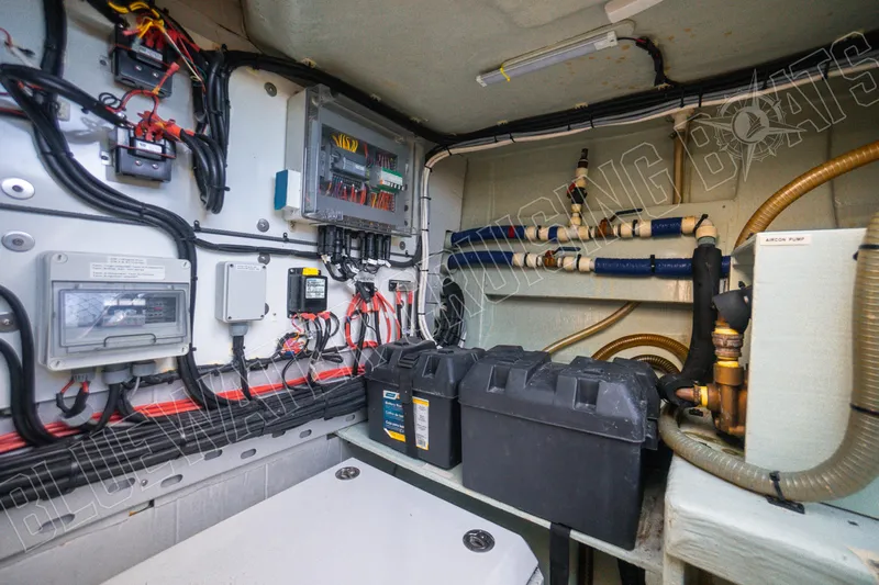 Sea Dog Yacht Photos Pics Electrical and plumbing systems inside a 2020 Leopard 58 yacht engine room.