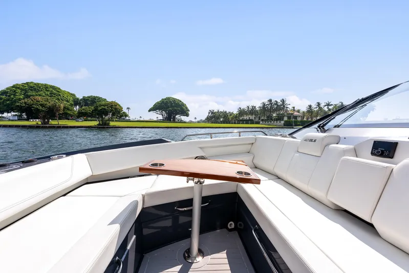  Yacht Photos Pics Luxurious 2023 Cruisers Yachts 42 GLS OB interior with scenic waterfront view.