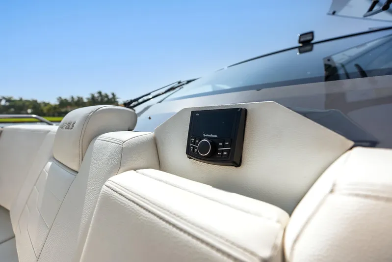  Yacht Photos Pics 2023 Cruisers Yachts 42 GLS OB interior with audio system and luxurious seating.