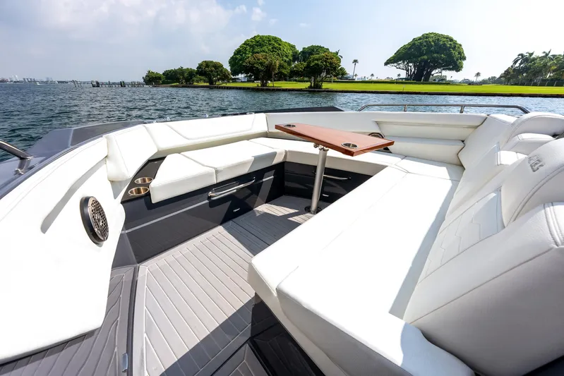  Yacht Photos Pics Luxurious seating area on 2023 Cruisers Yachts 42 GLS OB, overlooking serene waters.