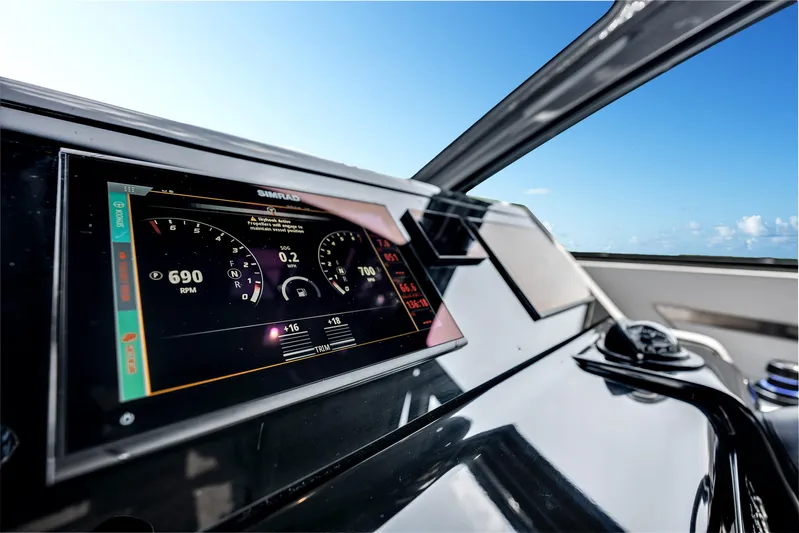  Yacht Photos Pics 2023 Cruisers Yachts 42 GLS OB dashboard with digital display and ocean view.