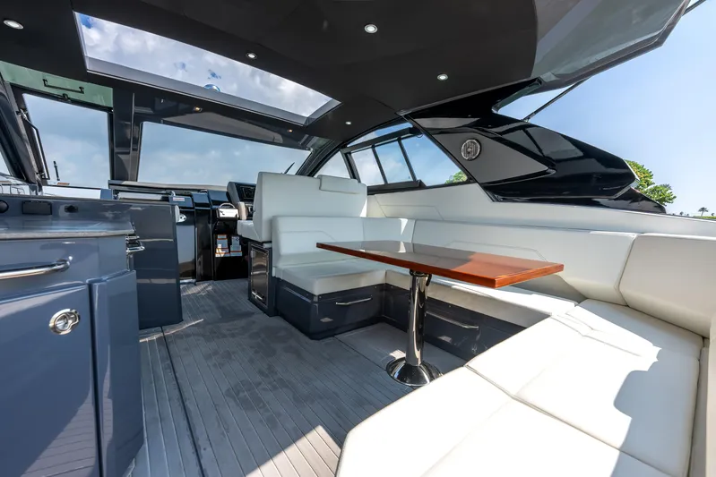  Yacht Photos Pics 2023 Cruisers Yachts 42 GLS OB interior with sleek seating and modern design.