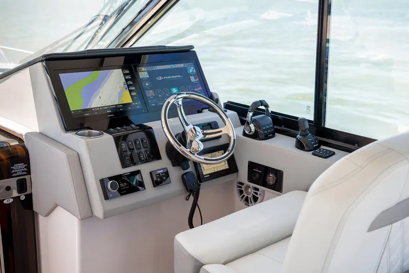  Yacht Photos Pics Manufacturer Provided Image: Helm of 2026 Regal 36 Grande Coupe with modern navigation and control systems.