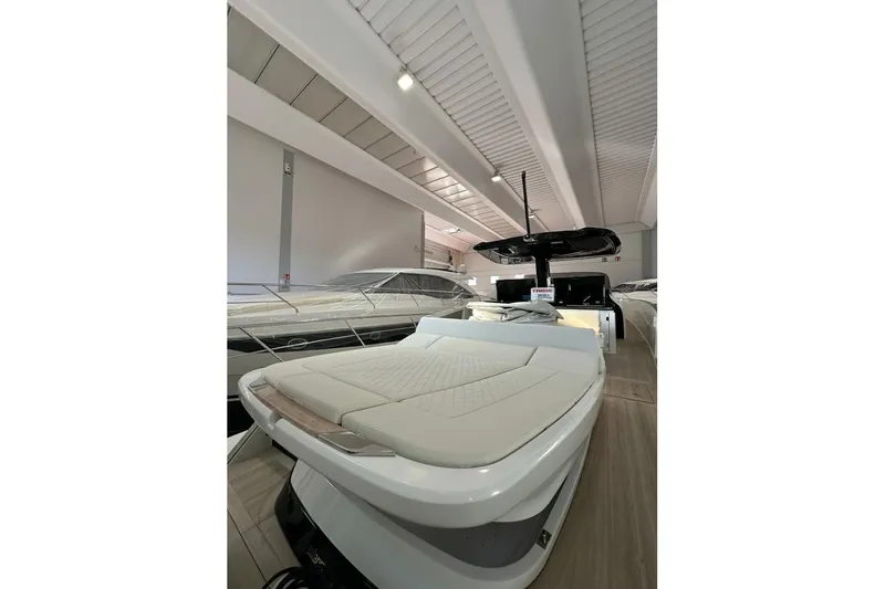  Yacht Photos Pics 2024 Solaris Power 44 Open luxury yacht interior with sleek design and spacious seating.