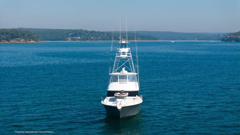 Viking 60 Yacht Photos Pics 2008 Viking 60 Convertible yacht on serene blue waters.