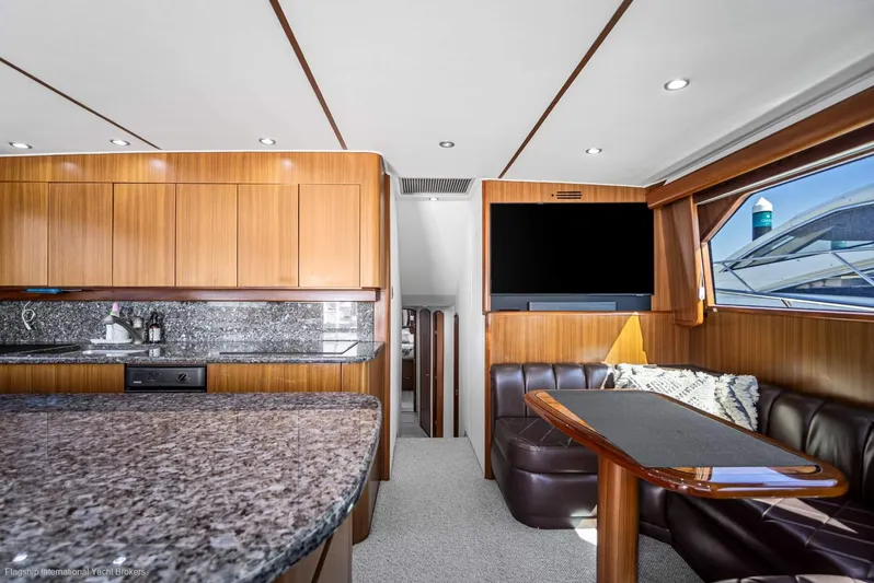 Viking 60 Yacht Photos Pics Luxurious interior of 2008 Viking 60 Convertible yacht with granite countertops and leather seating.