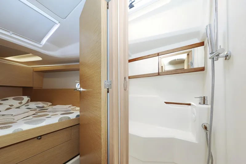 Apollo Yacht Photos Pics 2019 Hanse 458 yacht interior with cozy bedroom and modern bathroom.