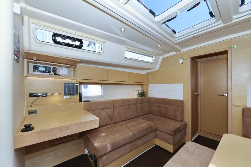 Apollo Yacht Photos Pics Interior of 2019 Hanse 458 yacht with modern seating and navigation equipment.