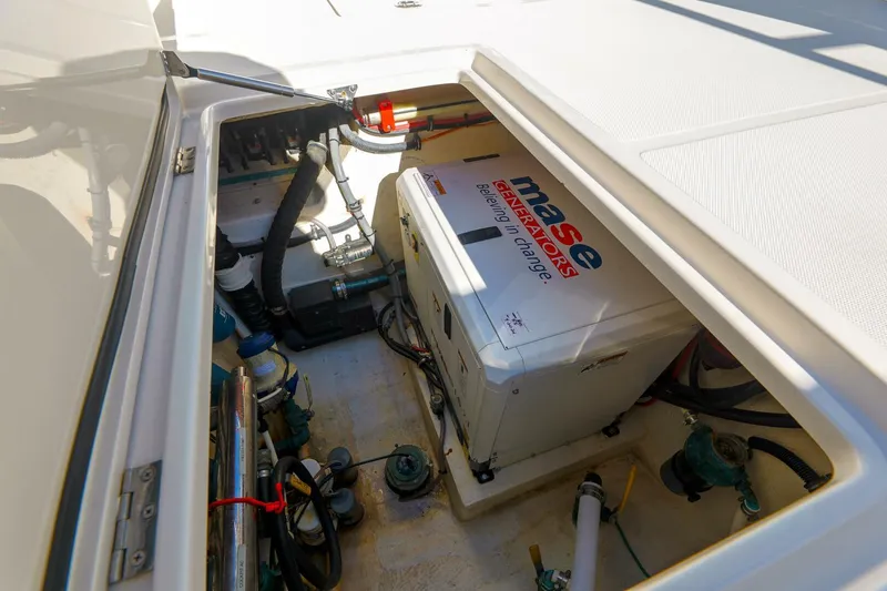 Tranquila Yacht Photos Pics Engine compartment of 2016 Jupiter 41 EX boat with Mase generator.