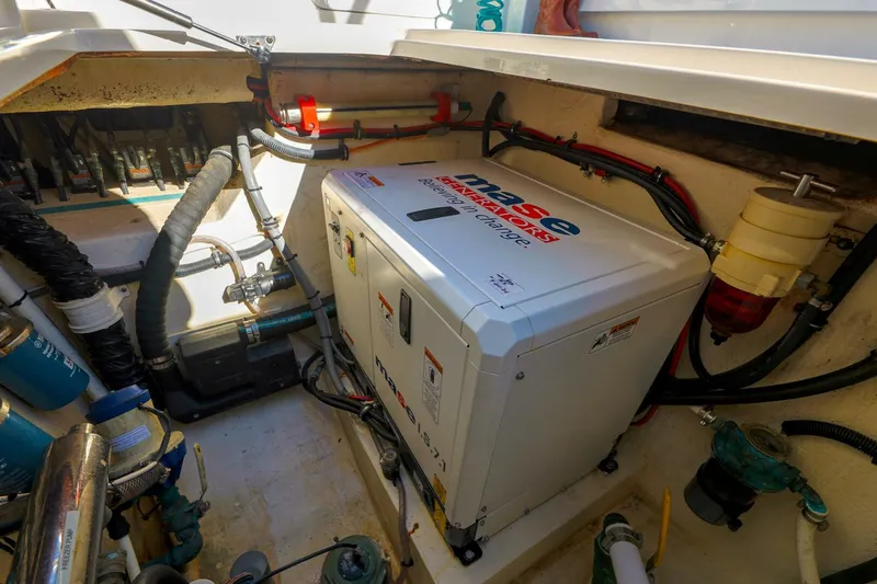 Tranquila Yacht Photos Pics Engine room of 2016 Jupiter 41 EX with Mase generator and various components.