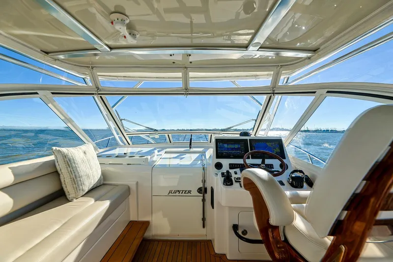 Tranquila Yacht Photos Pics Luxurious 2016 Jupiter 41 EX yacht interior with ocean view and modern helm.