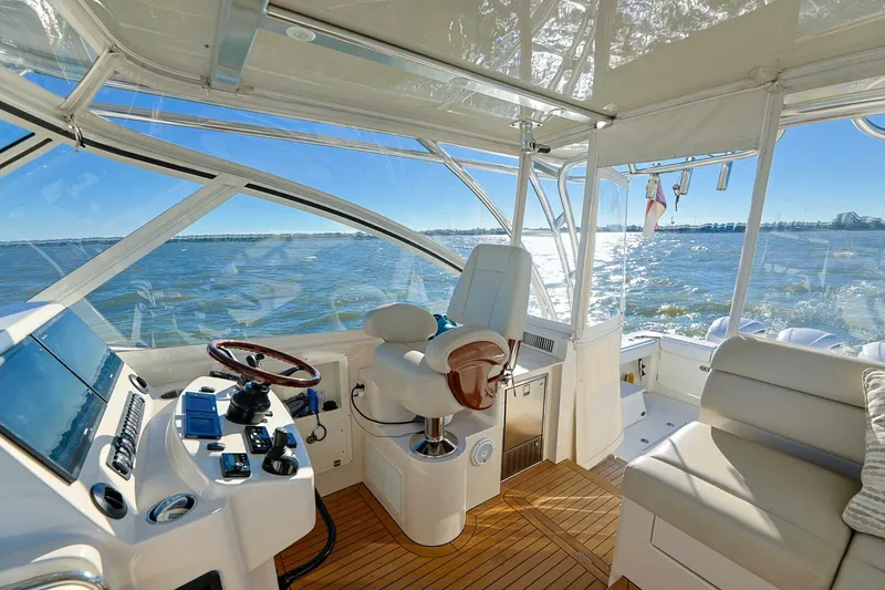 Tranquila Yacht Photos Pics Luxurious 2016 Jupiter 41 EX yacht interior with ocean view and modern helm.