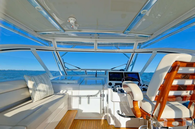 Tranquila Yacht Photos Pics Luxurious 2016 Jupiter 41 EX yacht interior with ocean view and modern helm.
