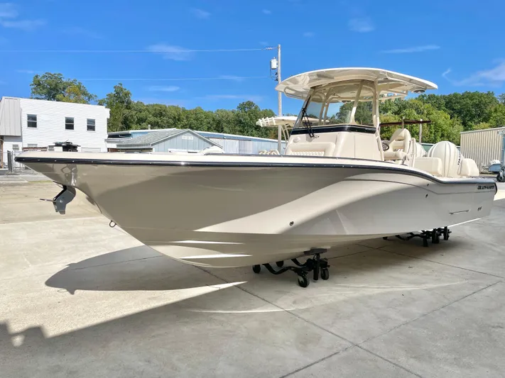  Yacht Photos Pics 2025 Grady-White 281 Coastal Explorer boat on display outdoors.