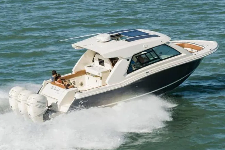  Yacht Photos Pics Manufacturer Provided Image: 2022 Scout 350 LXZ boat cruising on the water.