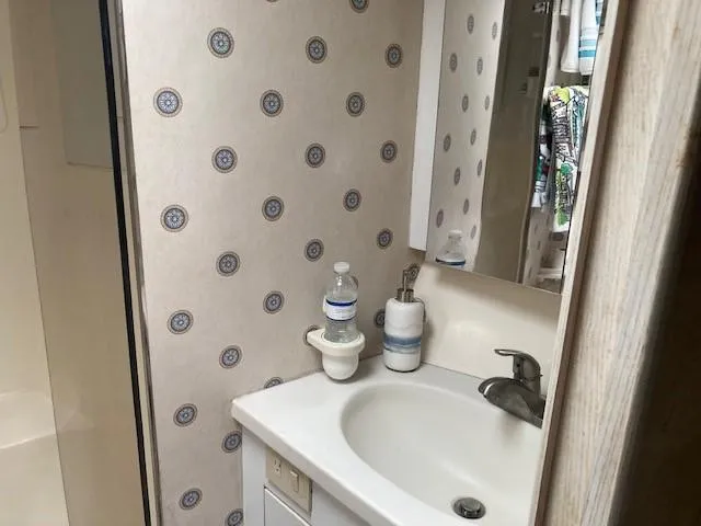 Lady G Yacht Photos Pics Bathroom sink area on a 1998 Ocean Yachts 45 Super Sport.