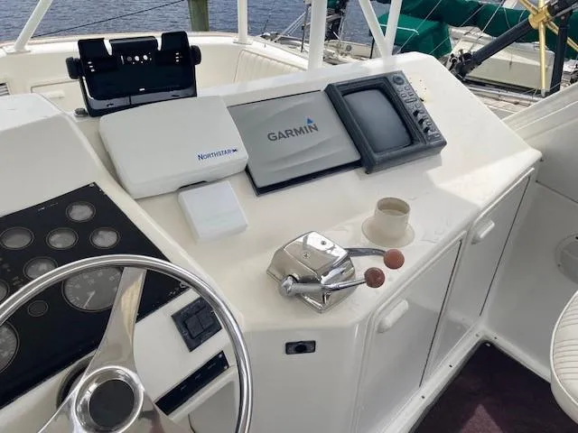 Lady G Yacht Photos Pics 1998 Ocean Yachts 45 Super Sport helm with Garmin and Northstar navigation systems.