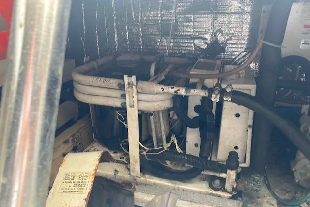 Lady G Yacht Photos Pics Engine room of a 1998 Ocean Yachts 45 Super Sport with mechanical equipment.