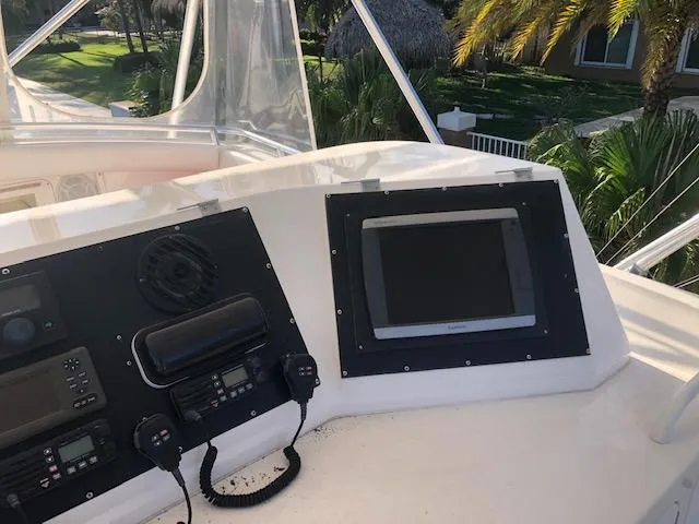  Yacht Photos Pics Control panel of a 1997 Bertram Convertible yacht with navigation equipment.