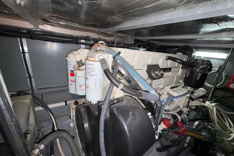 Andiamo II Yacht Photos Pics Engine room of 2002 Sea Ray 480 Motor Yacht with visible components and wiring.