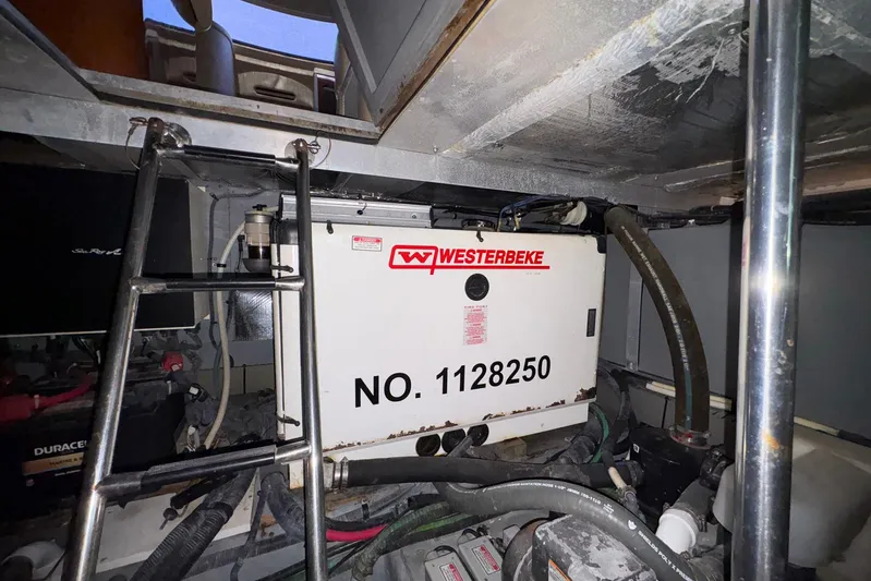 Andiamo II Yacht Photos Pics Engine room of 2002 Sea Ray 480 Motor Yacht with Westerbeke generator.