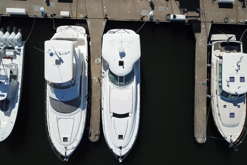 Andiamo II Yacht Photos Pics Aerial view of 2002 Sea Ray 480 Motor Yacht docked at marina.