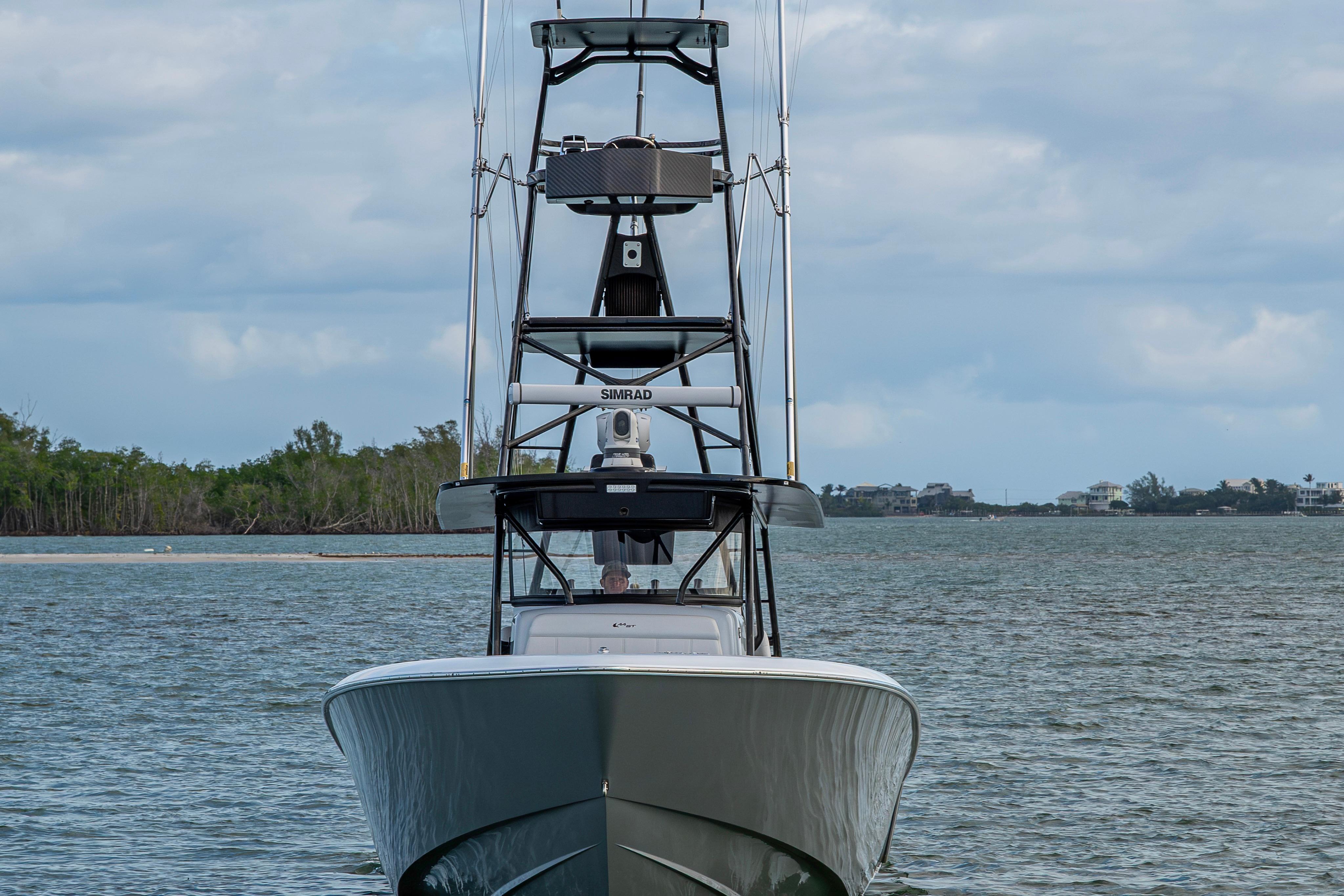 2024 Contender 44 ST boat on water, front view with tower and electronics.