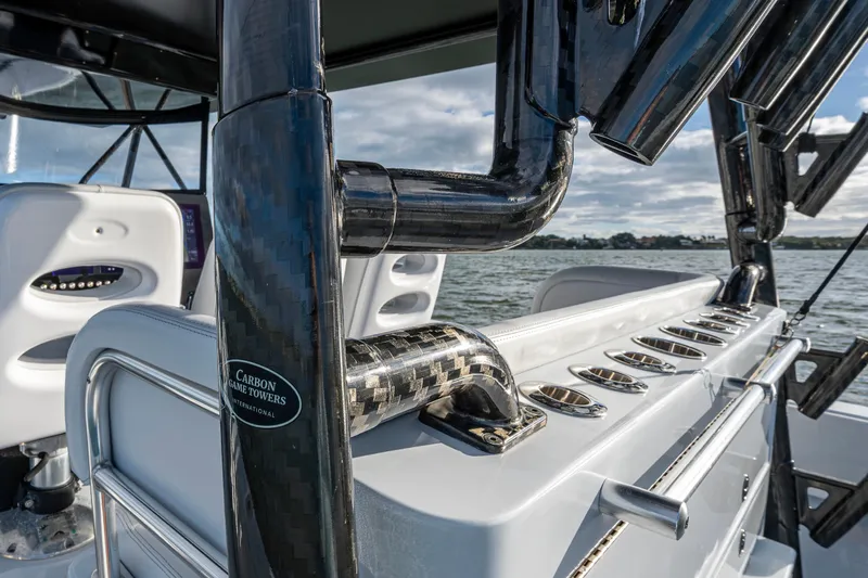  Yacht Photos Pics 2024 Contender 44 ST boat with carbon fiber details and rod holders on deck.