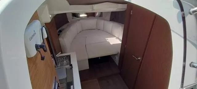  Yacht Photos Pics Interior of 2019 Jeanneau Cap Camarat 10.5 WA, featuring a cozy seating area.