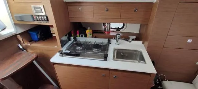  Yacht Photos Pics Compact kitchen area in a 2019 Jeanneau Cap Camarat 10.5 WA boat.