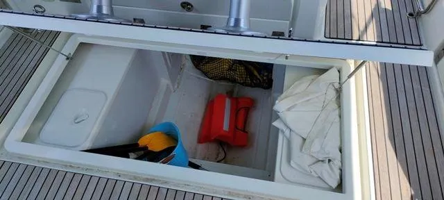 Yacht Photos Pics Open storage compartment on 2019 Jeanneau Cap Camarat 10.5 WA boat deck.