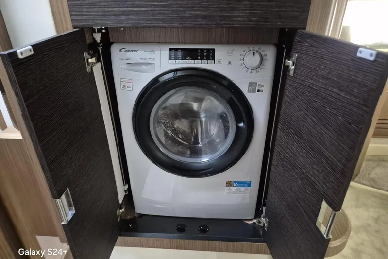  Yacht Photos Pics Built-in Candy washing machine on Absolute 52 FLY yacht, 2018 model.