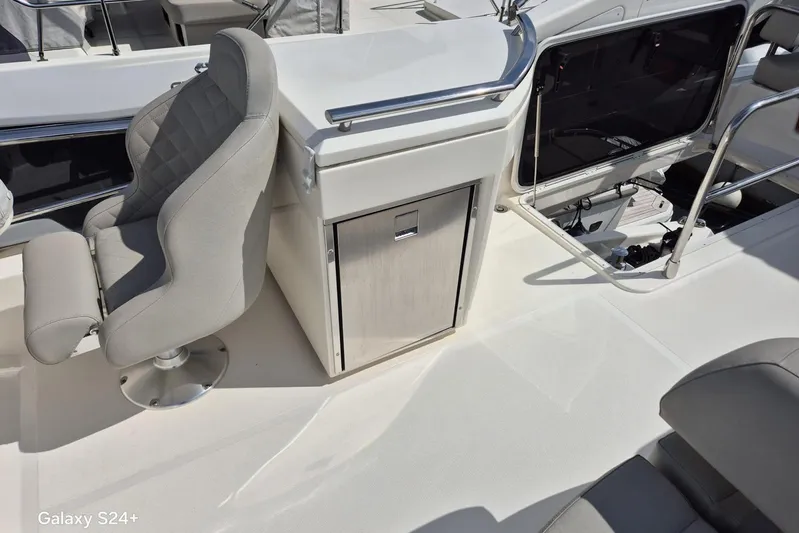  Yacht Photos Pics Luxury seating area on 2018 Absolute 52 FLY yacht deck.