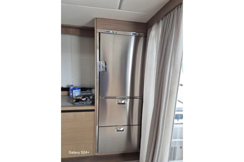  Yacht Photos Pics Stainless steel refrigerator in 2018 Absolute 52 FLY yacht interior.