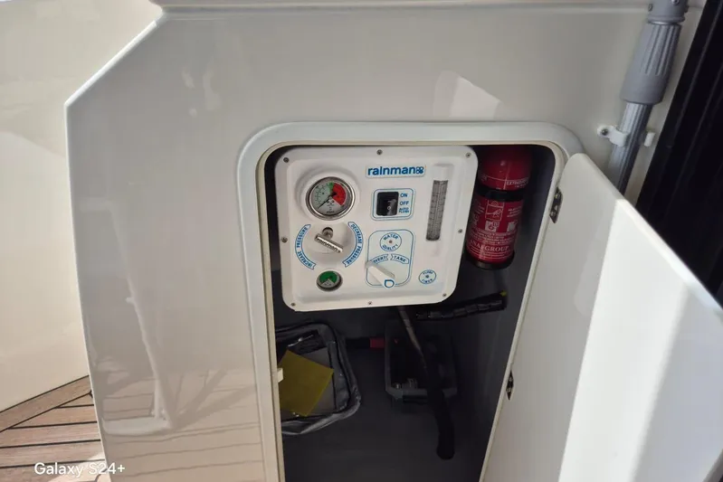  Yacht Photos Pics Control panel and fire extinguisher on 2018 Absolute 52 FLY yacht.