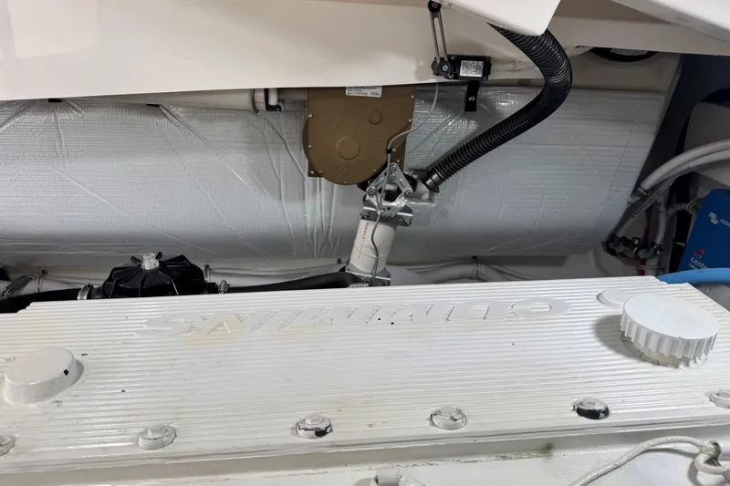  Yacht Photos Pics Engine compartment of 2022 Tiara Yachts 43 Open, showcasing mechanical components.