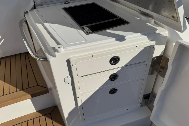  Yacht Photos Pics 2022 Tiara Yachts 43 Open yacht kitchen area with storage drawers and countertop.