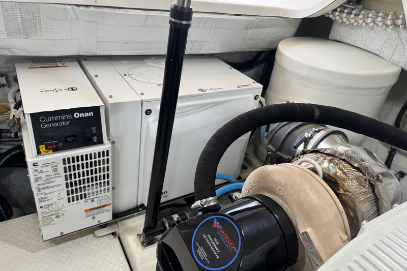  Yacht Photos Pics Engine room of 2022 Tiara Yachts 43 Open with Cummins Onan generator.