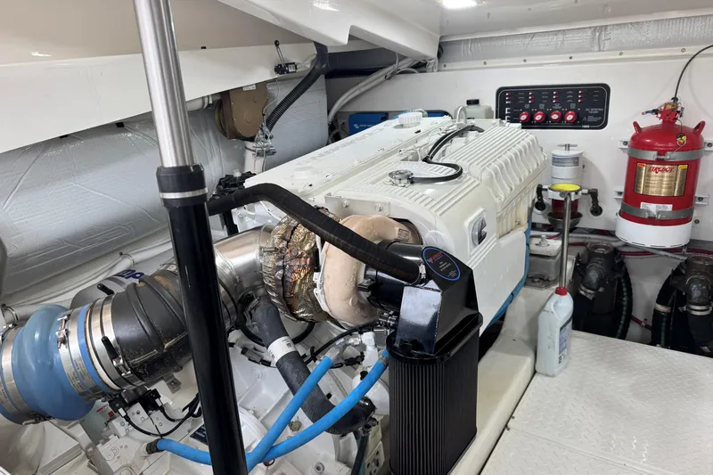  Yacht Photos Pics Engine room of 2022 Tiara Yachts 43 Open, featuring modern equipment and fire safety system.
