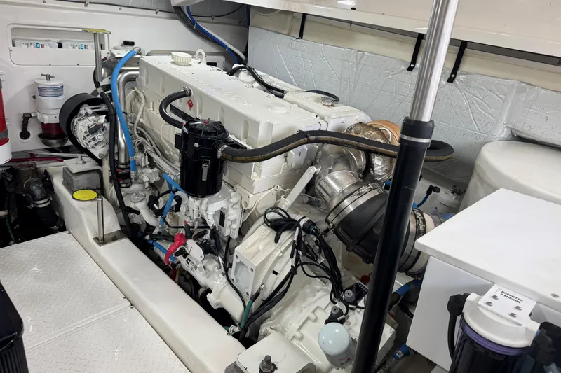 Yacht Photos Pics Engine room of 2022 Tiara Yachts 43 Open, showcasing clean and organized machinery.