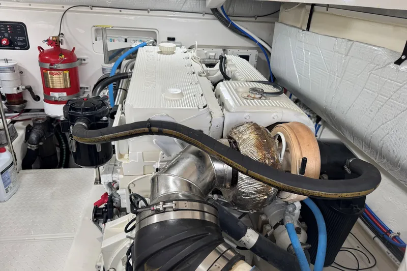  Yacht Photos Pics Engine room of 2022 Tiara Yachts 43 Open, featuring detailed mechanical components.