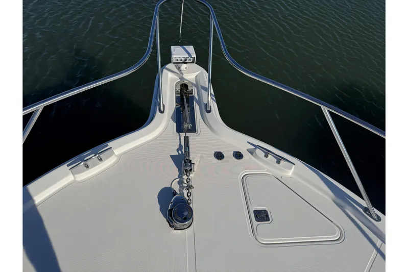  Yacht Photos Pics Bow view of 2022 Tiara Yachts 43 Open, featuring anchor and railing.